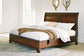 Cama Queen tipo trineo con espacio de almacenamiento Trellington