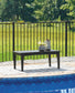 Ashley Express - Mesa de cóctel rectangular Hyland wave