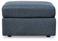 Ashley Express - Otomana extragrande con acento Modmax