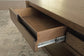 Ashley Express - Mesa de cóctel rectangular Roanhowe